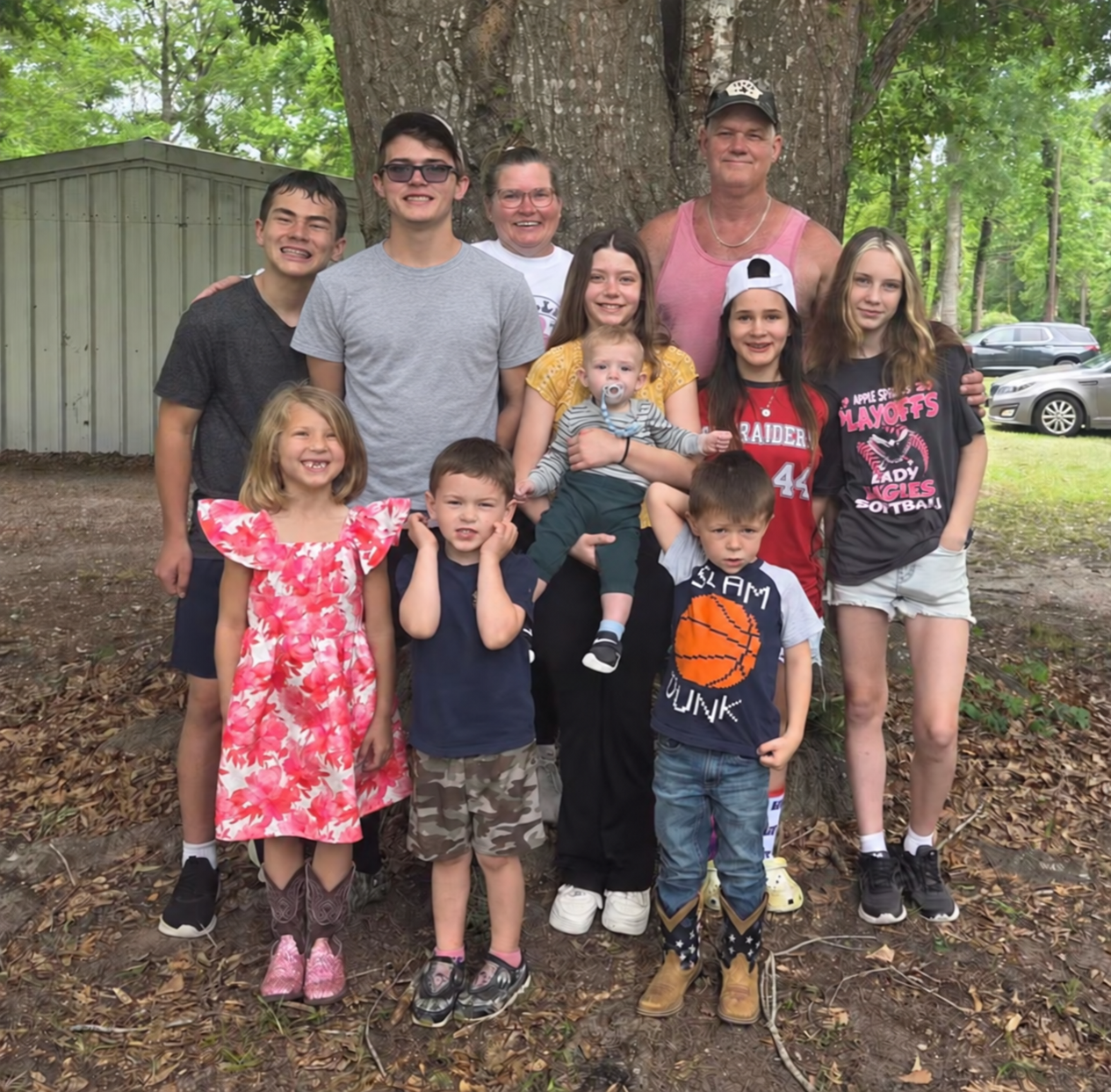 Margie and Randy West with their nine grandchildren